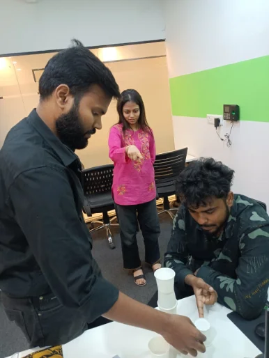 Team members reviewing work together at Graphketing